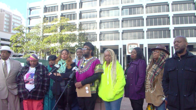 Memphis activists stand outside Memphis City Hall calling on elected officials to create a...