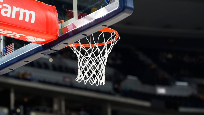 A basketball hoop and net in the first half of an NBA basketball game Thursday, Dec. 23, 2021,...