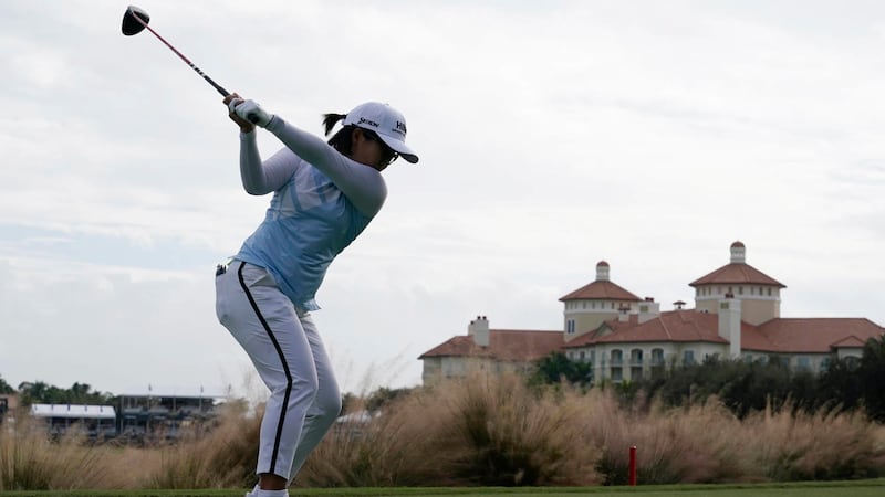 Nasa Hataoka, of Japan, plays her shot from the 18th tee during the first round of the LPGA...