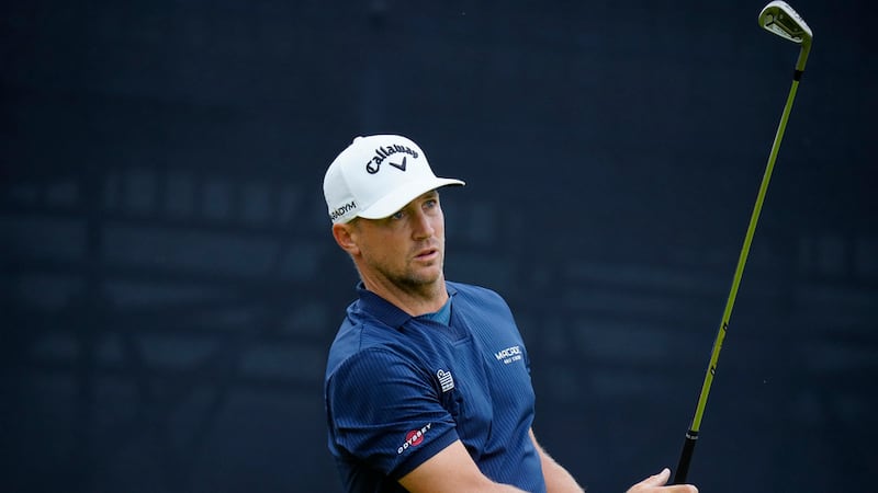 Sweden's Alex Noren plays his tee shot on the 2nd hole during the third day of the British...