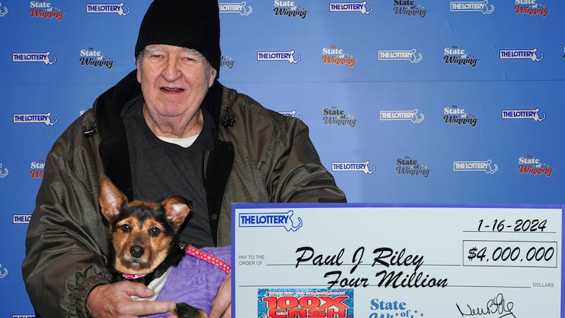A Peabody man and his dog are now millionaires thanks to the Mass. Lottery.