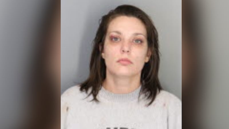 Woman attacks victims with knife, police say