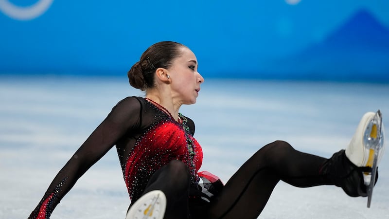 Kamila Valieva, of the Russian Olympic Committee, falls in the women's free skate program...