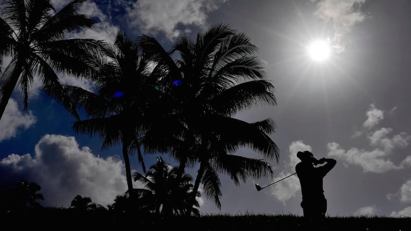 Michael Kim hits from the 14th tee during the second round of the Sony Open golf event,...