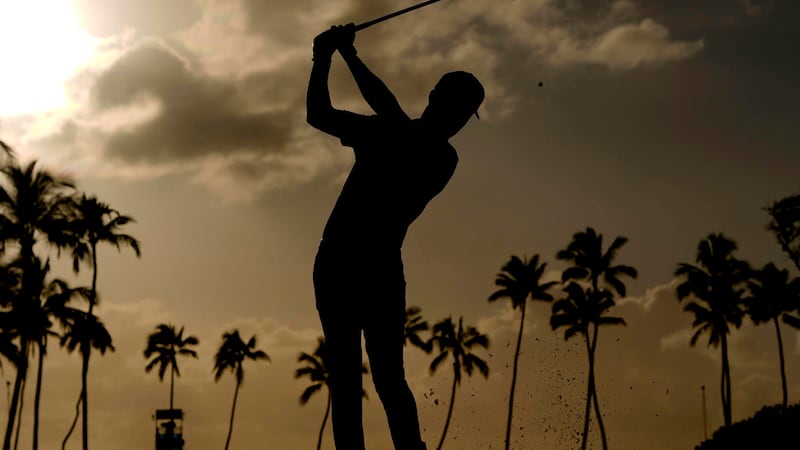 Eric Cole hits from the 11th tee during the second round of the Sony Open golf event, Friday,...