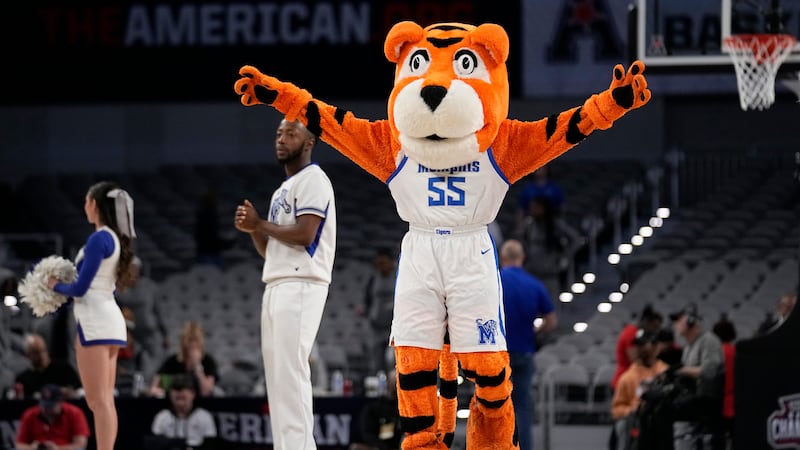 The Memphis mascot, Pouncer, motivates fans during an NCAA college basketball game against...