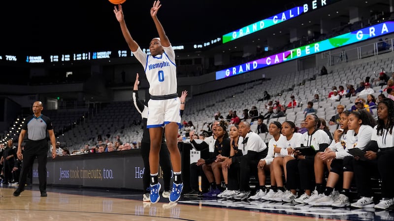 Memphis guard Destyne Jackson attempts a three-point basket during an NCAA college basketball...