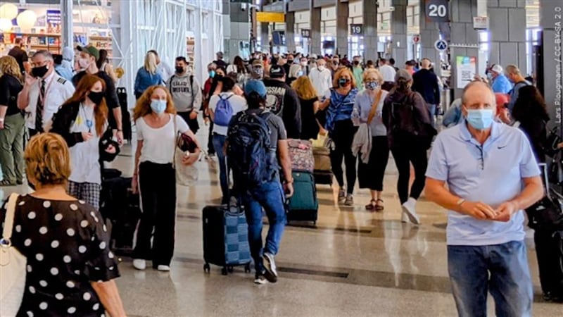 Travelers wearing masks at Austin Airport, Photo Date: 5/14/2021
